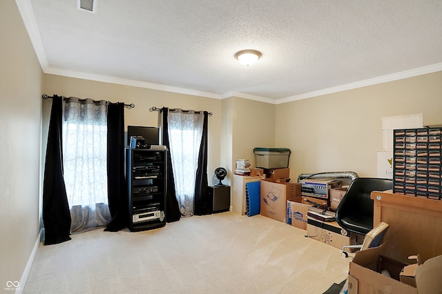 carpeted home office with a textured ceiling and ornamental molding