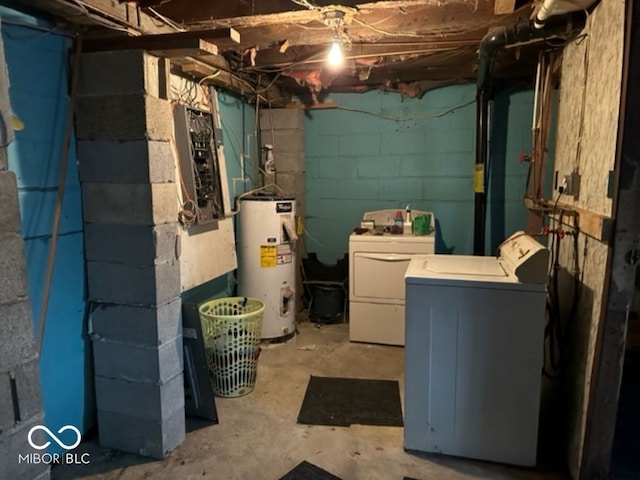 basement with gas water heater and washing machine and clothes dryer