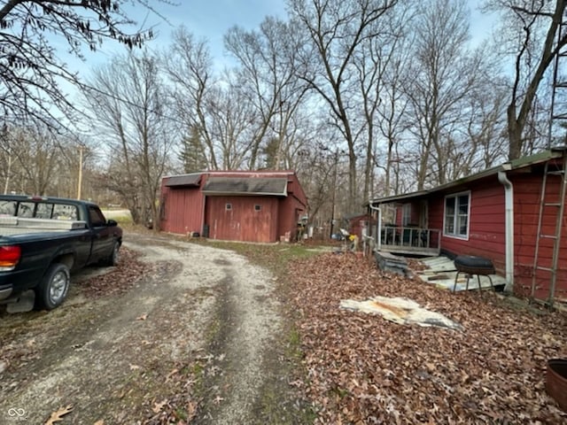 exterior space featuring an outbuilding