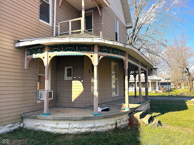 property entrance featuring covered porch