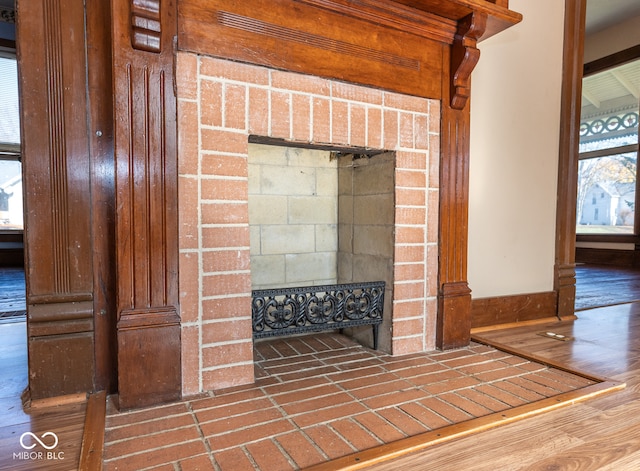 interior details with a fireplace and hardwood / wood-style floors