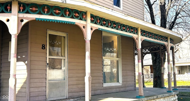 doorway to property featuring a porch