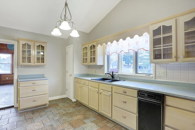 kitchen with cream cabinets, sink, hanging light fixtures, vaulted ceiling, and tasteful backsplash