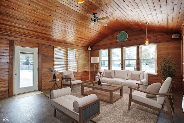 living room featuring vaulted ceiling, a wealth of natural light, and wooden ceiling