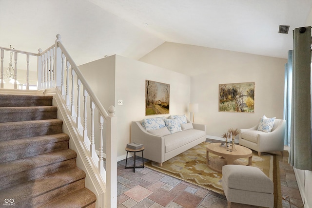 living room with vaulted ceiling