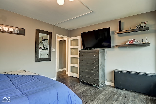 bedroom featuring dark wood-type flooring