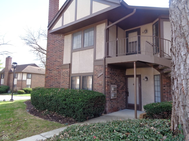 view of property exterior with a balcony