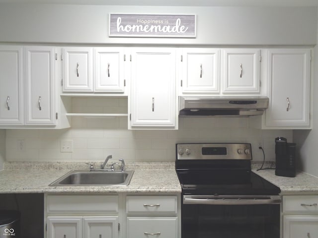 kitchen with white cabinets, sink, stainless steel electric range oven, tasteful backsplash, and extractor fan