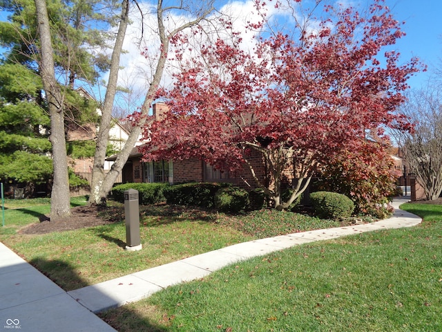 exterior space featuring a front yard