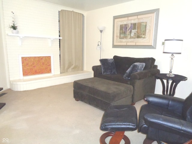 carpeted living room featuring a fireplace