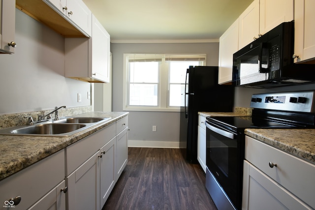 kitchen featuring sink, dark wood-type flooring, crown molding, stainless steel range with electric stovetop, and white cabinets