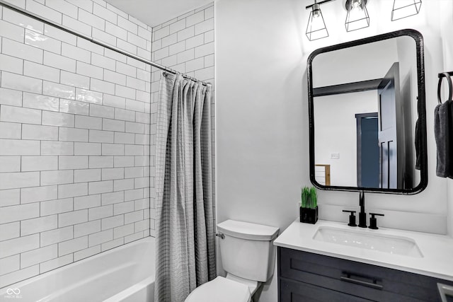 full bathroom with shower / bath combo, vanity, and toilet