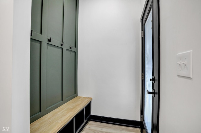 mudroom with light hardwood / wood-style flooring