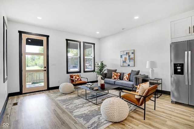 living room featuring light hardwood / wood-style flooring