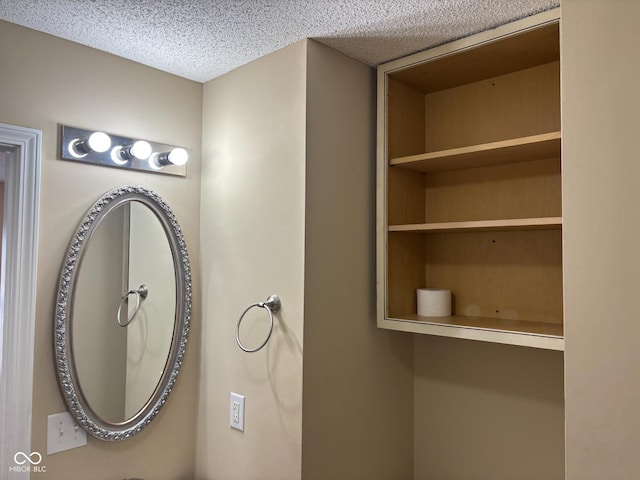 bathroom featuring a textured ceiling