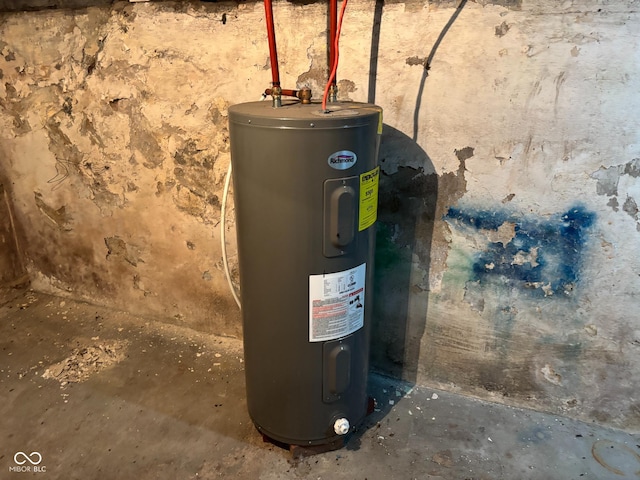 utility room with electric water heater