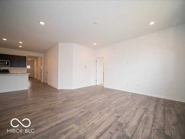6322 Granby Dr, Whitestown, IN 46075 - unfurnished living room with recessed lighting and wood finished floors