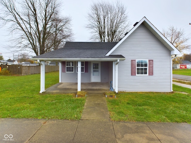 view of front of property with a front lawn