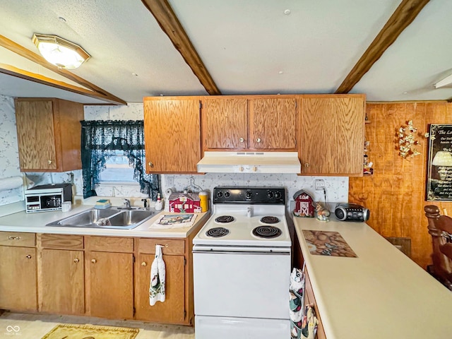 kitchen with electric range, sink, and beamed ceiling