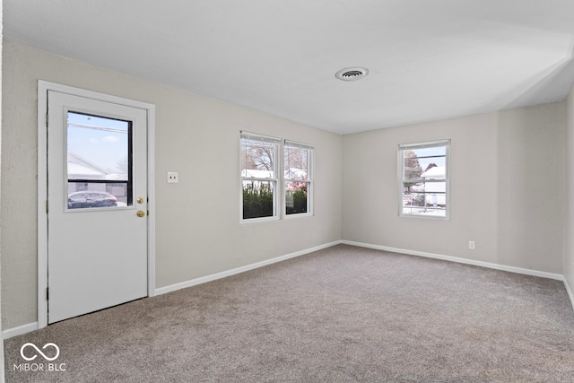 unfurnished room with carpet