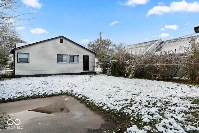 view of snow covered property