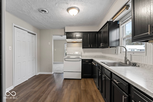 kitchen with white range with electric cooktop, sink, stainless steel dishwasher, dark hardwood / wood-style floors, and a textured ceiling