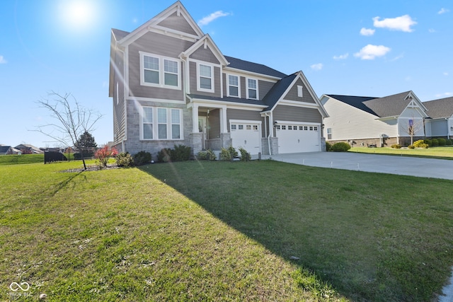 craftsman inspired home with a front lawn and a garage