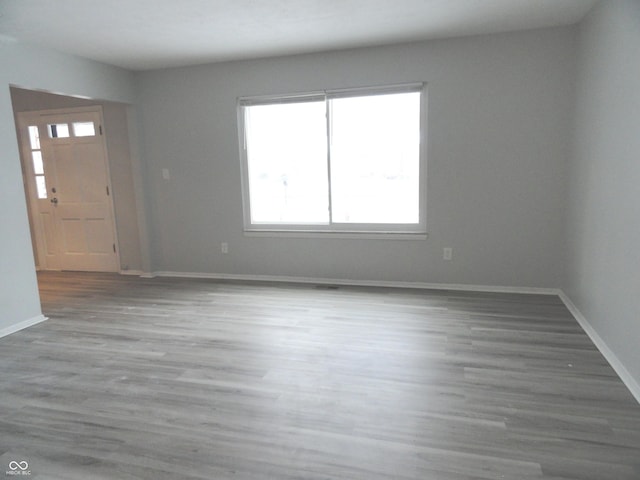 interior space with hardwood / wood-style flooring