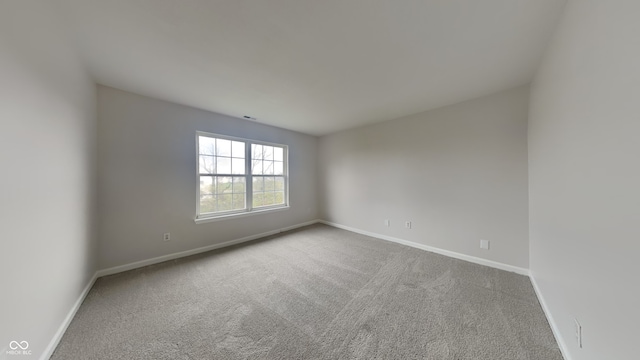 empty room with carpet floors