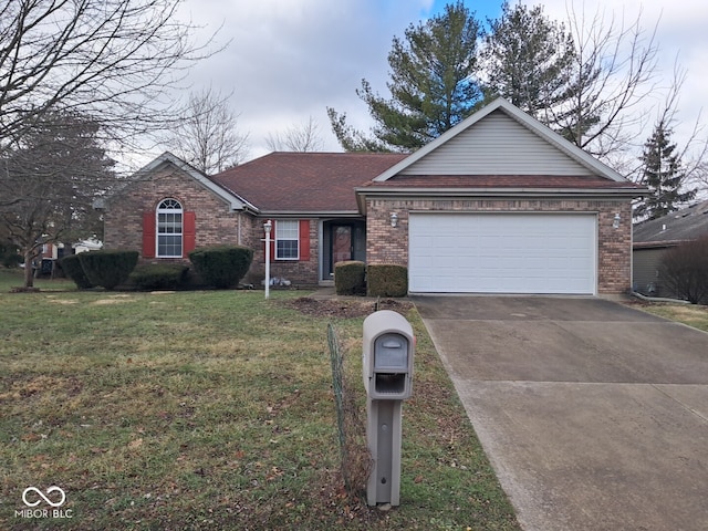 single story home with a front yard and a garage