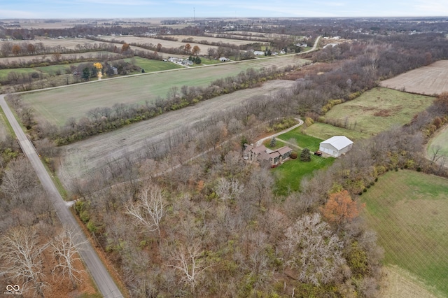 birds eye view of property featuring a rural view