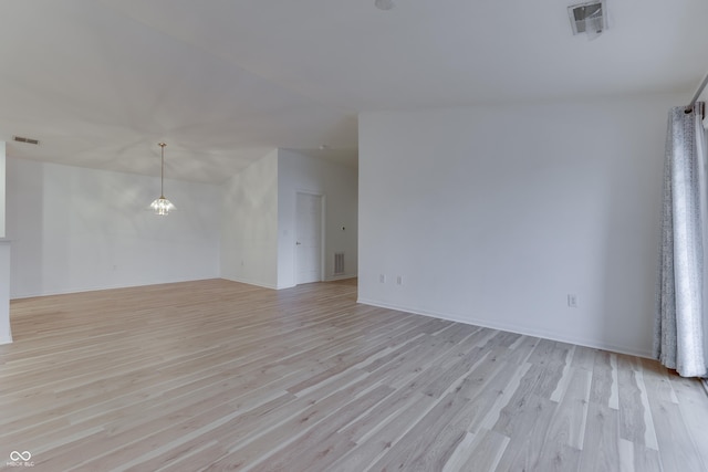 empty room featuring light hardwood / wood-style floors