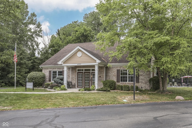 view of front of house with a front lawn