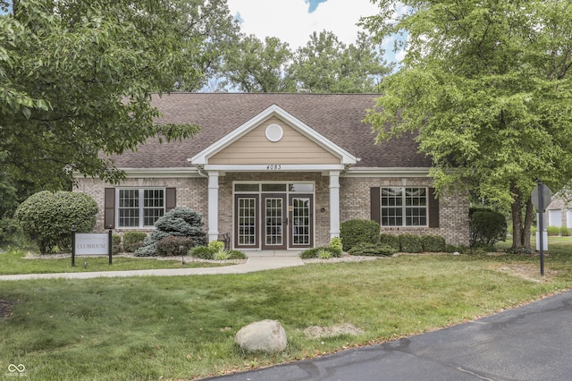 view of front of home featuring a front yard