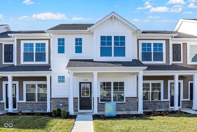 view of property featuring a front yard