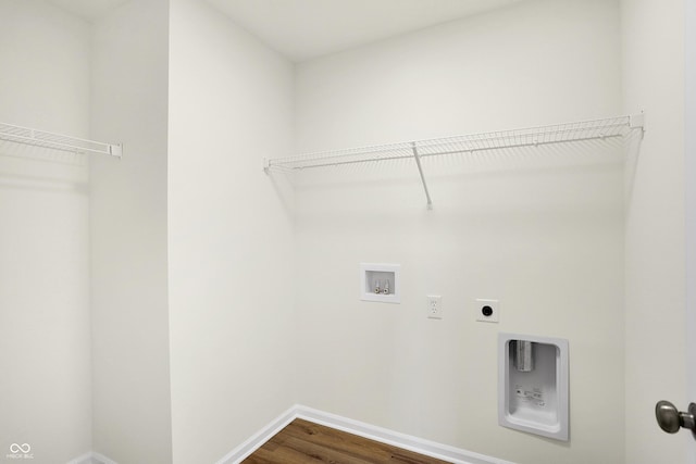 laundry area featuring wood-type flooring, washer hookup, and hookup for an electric dryer