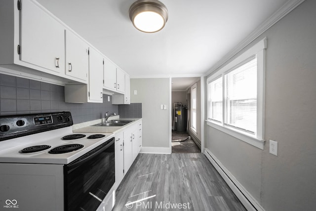 kitchen with white cabinets, white range with electric stovetop, sink, and hardwood / wood-style floors