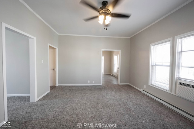 empty room with dark colored carpet, ceiling fan, crown molding, and a baseboard radiator