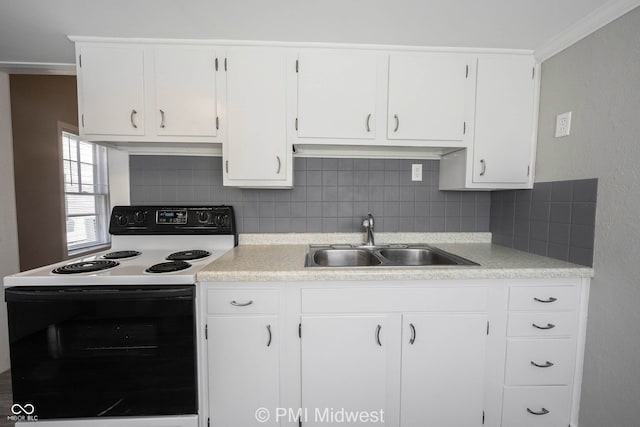 kitchen featuring white range with electric cooktop, white cabinetry, sink, and ornamental molding