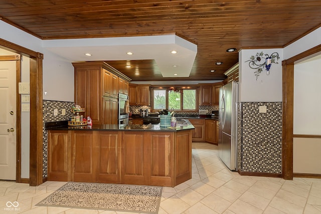 kitchen featuring wooden ceiling, stainless steel appliances, kitchen peninsula, decorative backsplash, and ornamental molding