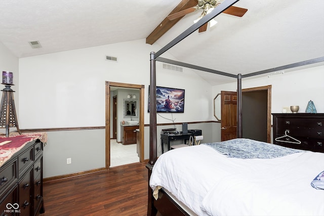 bedroom featuring vaulted ceiling with beams, ceiling fan, dark wood-type flooring, and a textured ceiling