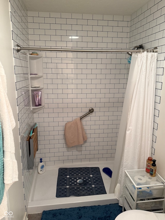 bathroom with a shower with curtain