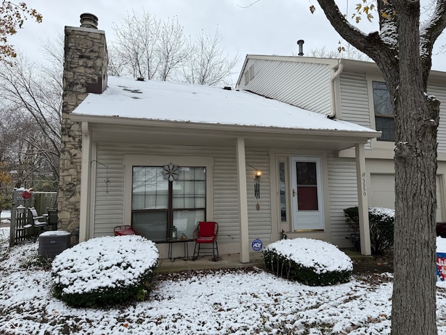 view of front of home featuring cooling unit