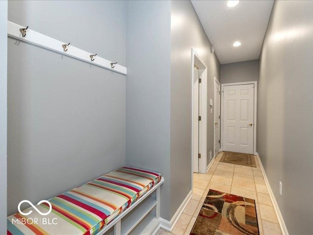12954 Water Ridge Dr, Fishers, IN 46055 - mudroom with light tile patterned flooring, recessed lighting, and baseboards