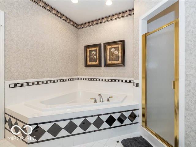 bathroom featuring tile patterned flooring and plus walk in shower