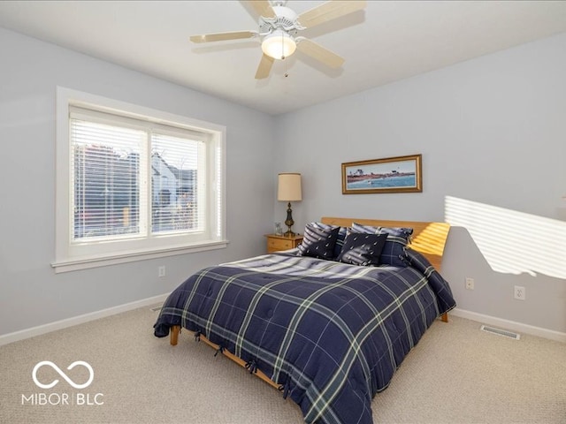 bedroom with carpet and ceiling fan