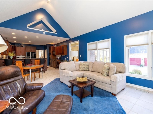 tiled living room with vaulted ceiling