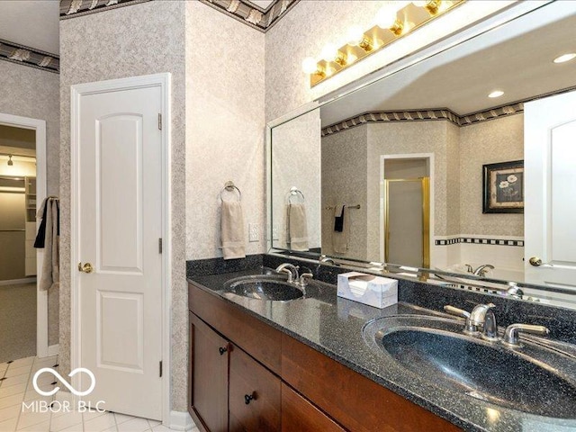 12954 Water Ridge Dr, Fishers, IN 46055 - full bath featuring double vanity, a shower stall, tile patterned flooring, and a closet