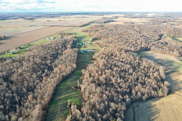 birds eye view of property featuring a rural view