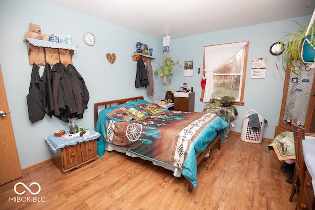 bedroom featuring light hardwood / wood-style flooring